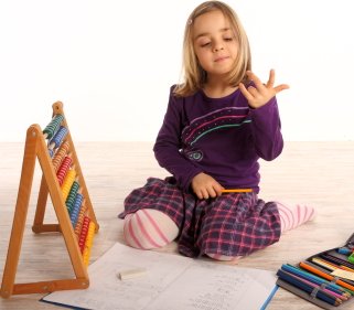 child counting with abacus